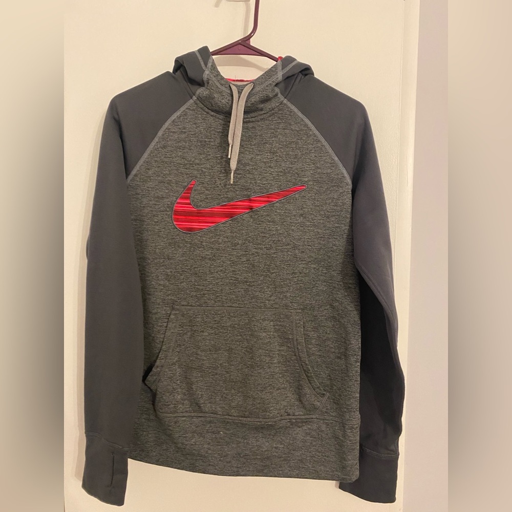 Nike hoodie gray with pink Nike symbol size medium women’s.